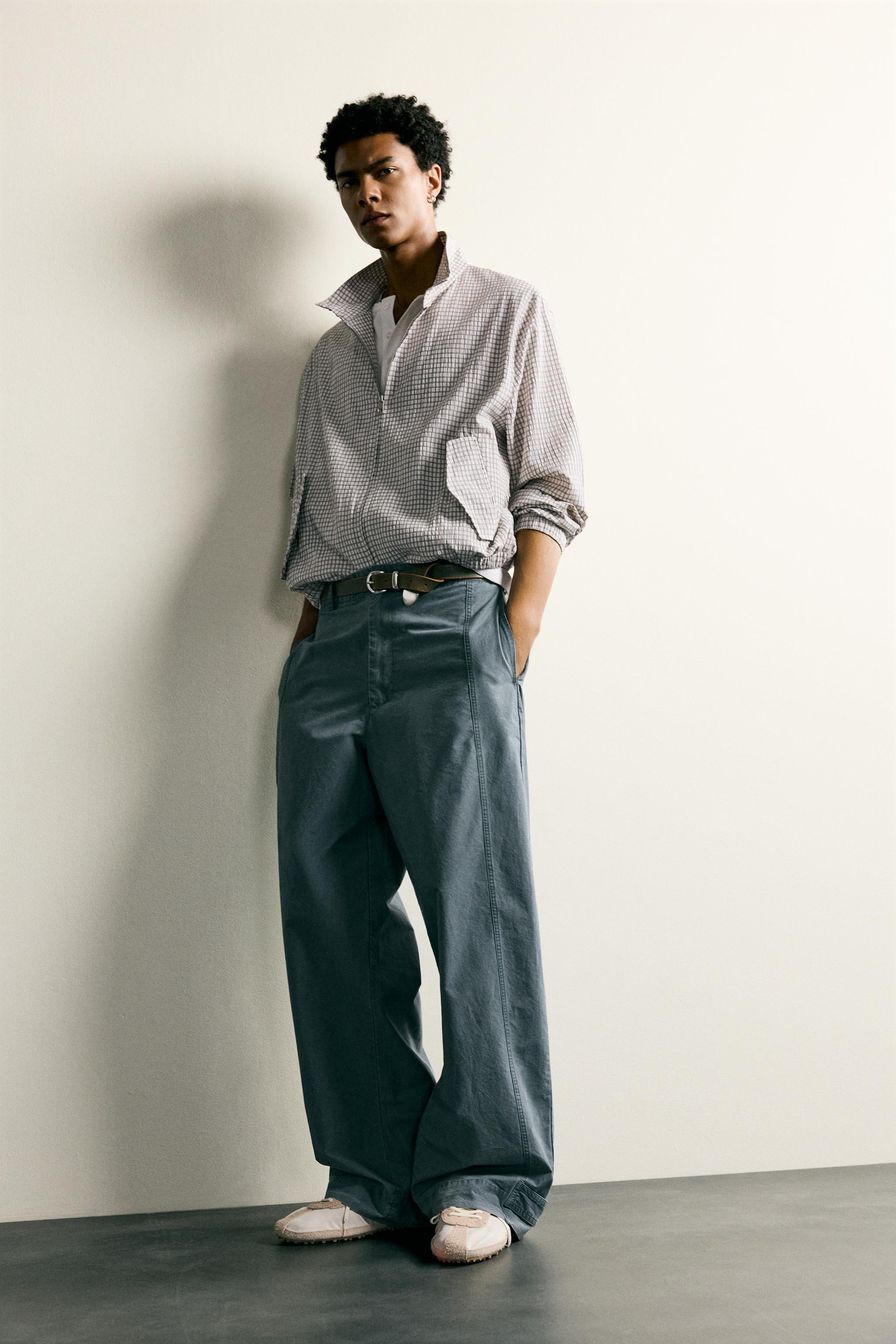 PANTALON DÉLAVÉ COUPE DÉCONTRACTÉE AVEC PATTES